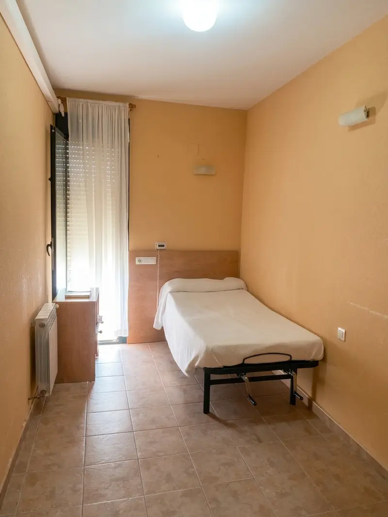 Habitación de Residencia de Mayores y Centro de Día Madroñera, en Madroñera